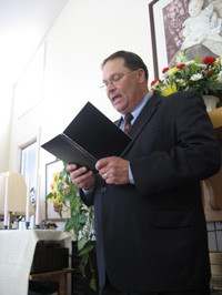 John reads